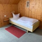 Zimmer 7 mit Bett